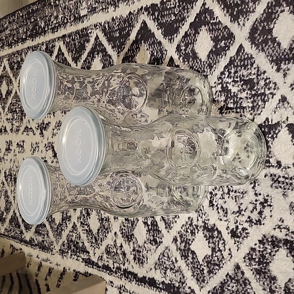 Set of 3 pitchers holds 34 oz.
